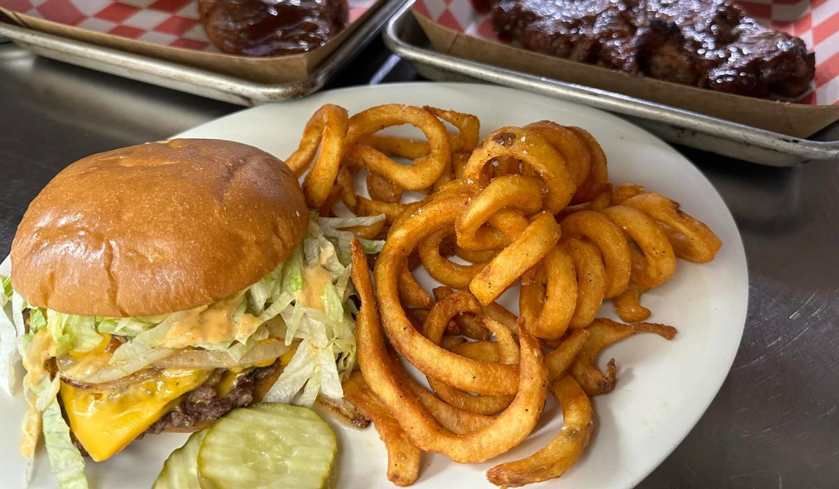 turf burger and curly fries image